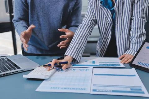 Business professional analyzing financial data on digital tablet dashboard .. Stock Photos
