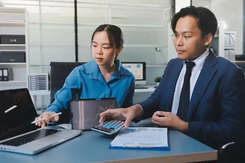 Business professional analyzing financial data on digital tablet dashboard .. Stock Photos