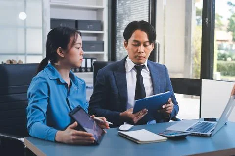 Business professional analyzing financial data on digital tablet dashboard .. Stock Photos
