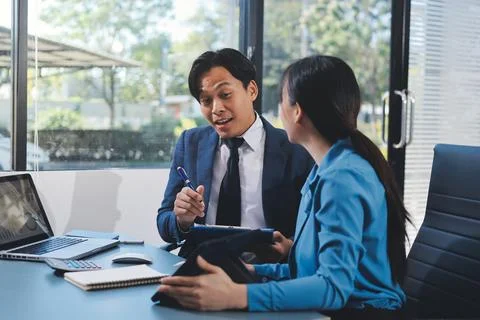 Business professional analyzing financial data on digital tablet dashboard .. Stock Photos