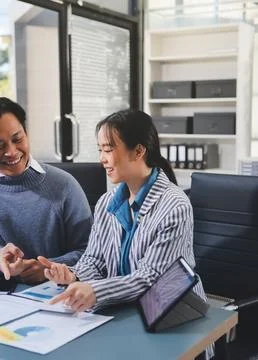 Business professional analyzing financial data on digital tablet dashboard .. Stock Photos
