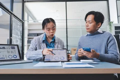 Business professional analyzing financial data on digital tablet dashboard .. Stock Photos