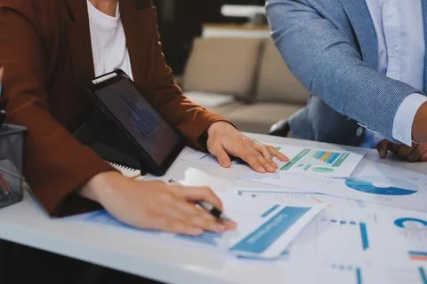 Business professional analyzing financial data on digital tablet dashboard .. Stock Photos
