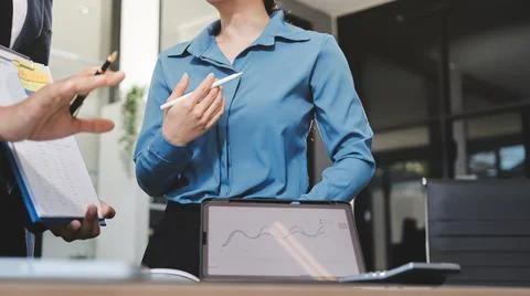 Business professional analyzing financial data on digital tablet dashboard .. Stock Photos
