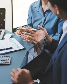 Business professional analyzing financial data on digital tablet dashboard .. Stock Photos