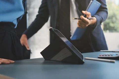 Business professional analyzing financial data on digital tablet dashboard .. Stock Photos