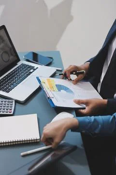 Business professional analyzing financial data on digital tablet dashboard .. Stock Photos