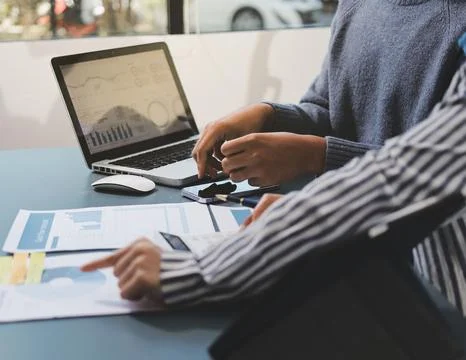 Business professional analyzing financial data on digital tablet dashboard .. Stock Photos