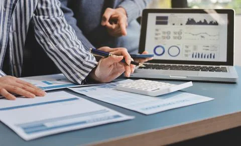Business professional analyzing financial data on digital tablet dashboard .. Stock Photos