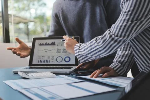 Business professional analyzing financial data on digital tablet dashboard .. Stock Photos