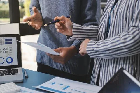 Business professional analyzing financial data on digital tablet dashboard .. Stock Photos