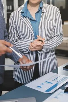 Business professional analyzing financial data on digital tablet dashboard .. Stock Photos