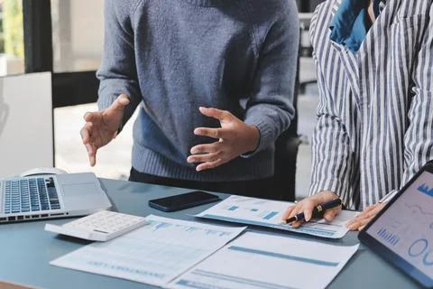 Business professional analyzing financial data on digital tablet dashboard .. Stock Photos