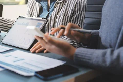 Business professional analyzing financial data on digital tablet dashboard .. Stock Photos