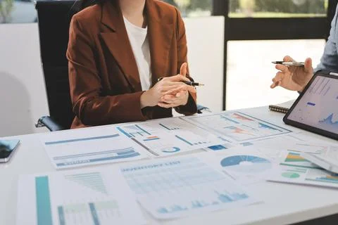 Business professional analyzing financial data on digital tablet dashboard .. Stock Photos