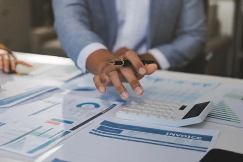 Business professional analyzing financial data on digital tablet dashboard .. Stock Photos