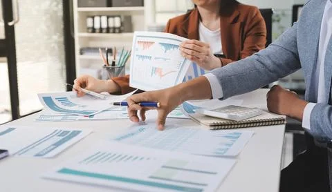 Business professional analyzing financial data on digital tablet dashboard .. Stock Photos