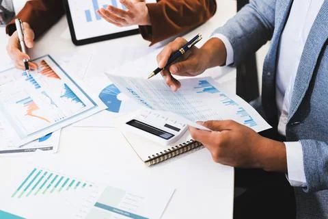Business professional analyzing financial data on digital tablet dashboard .. Stock Photos
