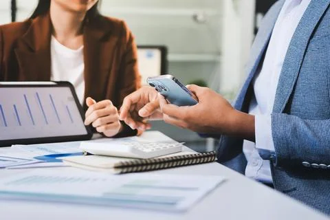 Business professional analyzing financial data on digital tablet dashboard .. Stock Photos