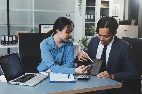Business professional analyzing financial data on digital tablet dashboard .. Stock Photos