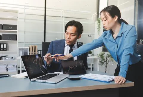Business professional analyzing financial data on digital tablet dashboard .. Stock Photos