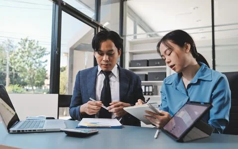 Business professional analyzing financial data on digital tablet dashboard .. Stock Photos