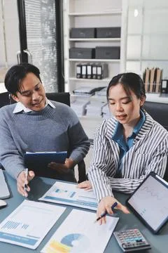 Business professional analyzing financial data on digital tablet dashboard .. Stock Photos