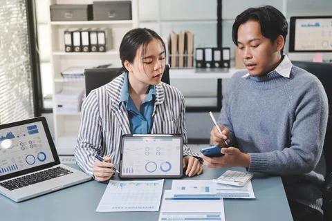 Business professional analyzing financial data on digital tablet dashboard .. Stock Photos