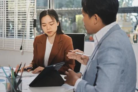 Business professional analyzing financial data on digital tablet dashboard .. Stock Photos