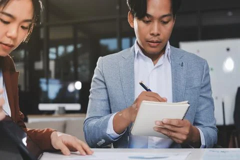 Business professional analyzing financial data on digital tablet dashboard .. Stock Photos