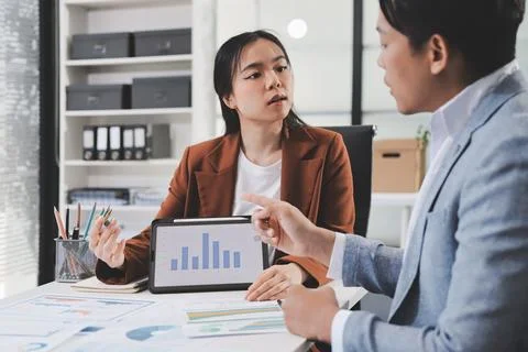 Business professional analyzing financial data on digital tablet dashboard .. Stock Photos