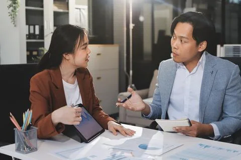 Business professional analyzing financial data on digital tablet dashboard .. Stock Photos