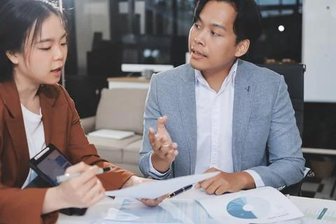 Business professional analyzing financial data on digital tablet dashboard .. Stock Photos