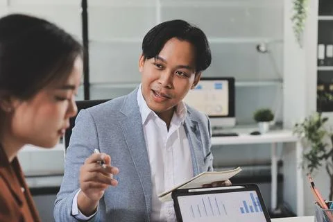 Business professional analyzing financial data on digital tablet dashboard .. Stock Photos