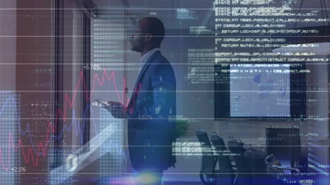 Business professional glancing at tablet by window and revealing code overlays Stock Footage 311140603