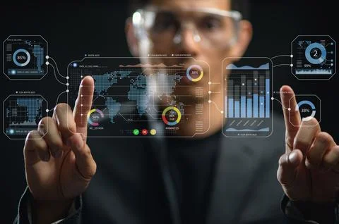 Business Professional Interacting with Digital Data Interface and Graphs Stock Photos
