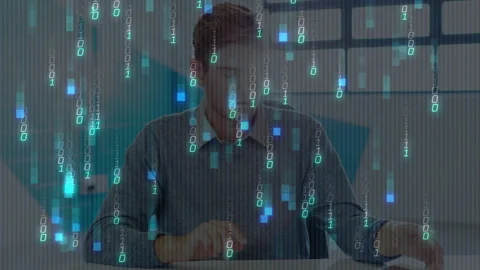 Business professional tapping tablet then comparing sheets for analysis with Stock Footage 311046900