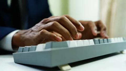 Business professional typing on computer keyboard, Close-up of a business p.. Stock Footage 348345163