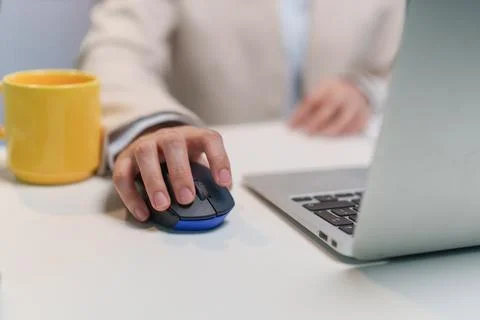 Business Professional Using Computer Mouse and Laptop 스톡 사진