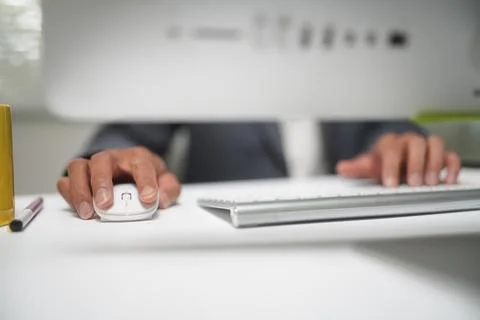 Business Professional Using Computer at Office Desk Stock Photos