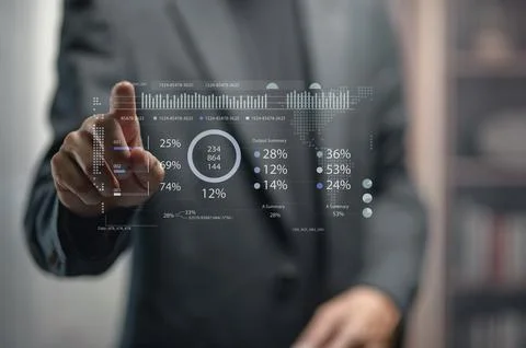 Business Professional Using Digital Data Visualization Interface in Office Stock Photos