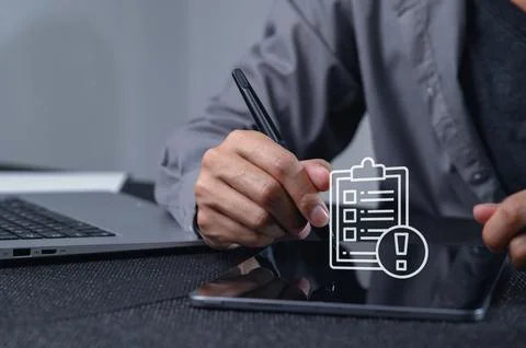Business Professional Using Digital Tablet for Task Management System Foto stock