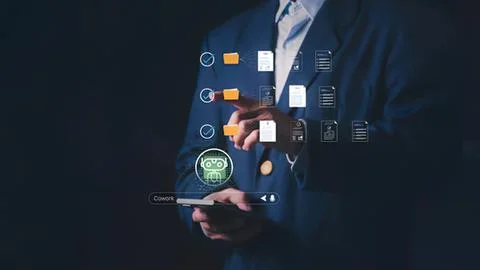 Business professional using digital tablet with data icons Stock Photos