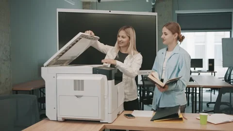 Business professionals collaborate on project documentation in a modern office Stock-Footage 310557451