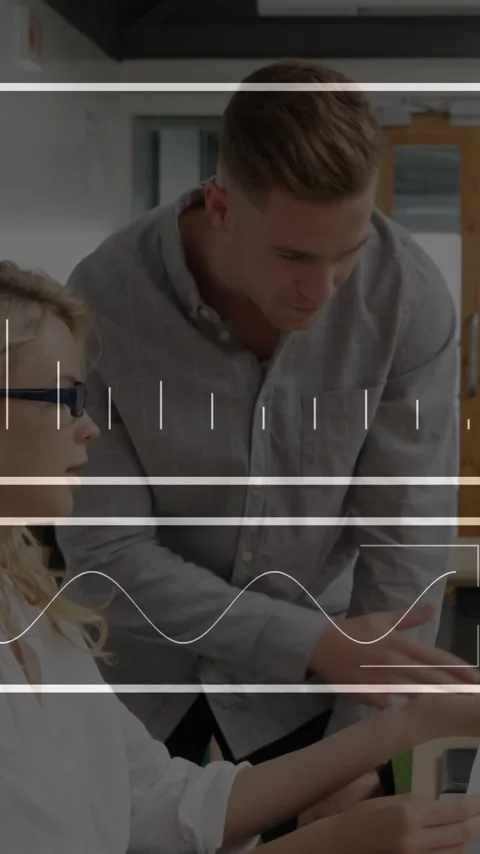 Business professionals collaborating at office with data analytics overlay Stock Footage 319810849