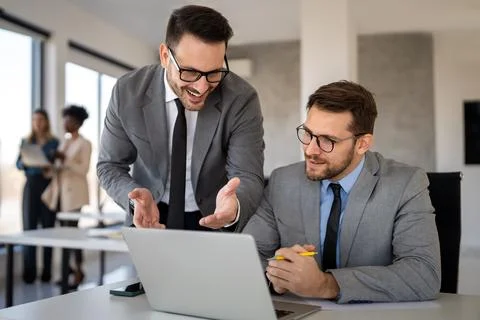 Business professionals explores artificial intelligence, machine learning, .. Stock Photos