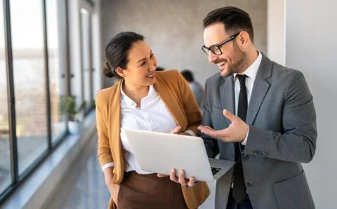 Business professionals explores artificial intelligence, machine learning, .. Stock Photos