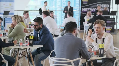 Business professionals networking at corporate tech event Stock Footage 279224731