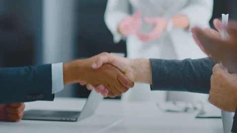 Business professionals shaking hands to finalize agreement and clapping dur.. Stock Footage 337545073