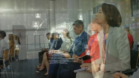 Business professionals sitting with code fading in and generating animated Stock Footage 311216828
